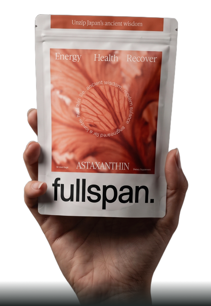 Hand holding a fullspan Astaxanthin pouch